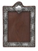 A late Victorian silver photograph frame by Henry Matthews