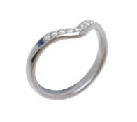 A diamond and sapphire wishbone ring