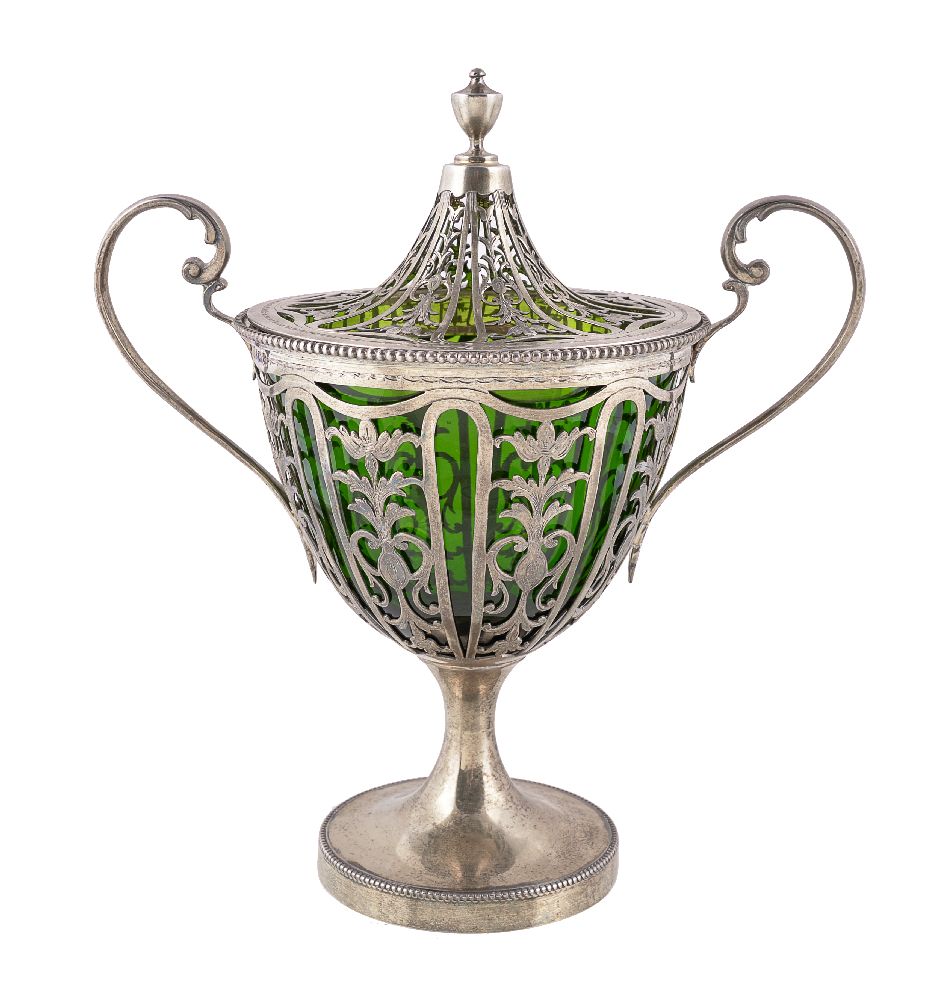 An Edwardian silver gilt sugar vase and cover