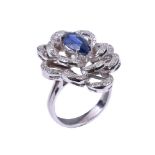 A sapphire and diamond flower head dress ring