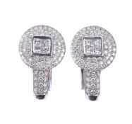 A pair of diamond earrings