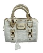 Gianni Versace, a white patent leather handbag