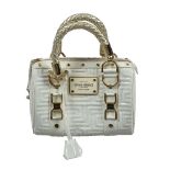 Gianni Versace, a white patent leather handbag