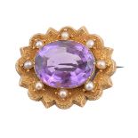 A Victorian amethyst and half pearl brooch