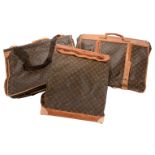 Louis Vuitton, a monogrammed canvas and leather suit carrier