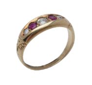 An early 20th century five stone ruby and diamond ring
