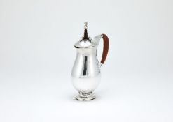 ϒ Georg Jensen, a Danish silver baluster chocolate pot or pitcher