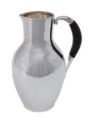 ϒ Georg Jensen, a Danish silver water jug or pitcher