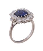 A sapphire and diamond panel ring