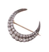 A Victorian diamond crescent brooch