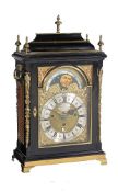 ϒ A fine George II gilt brass mounted ebonised quarter-chiming table clock with moonphase