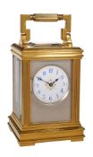 A French gilt brass miniature carriage timepiece