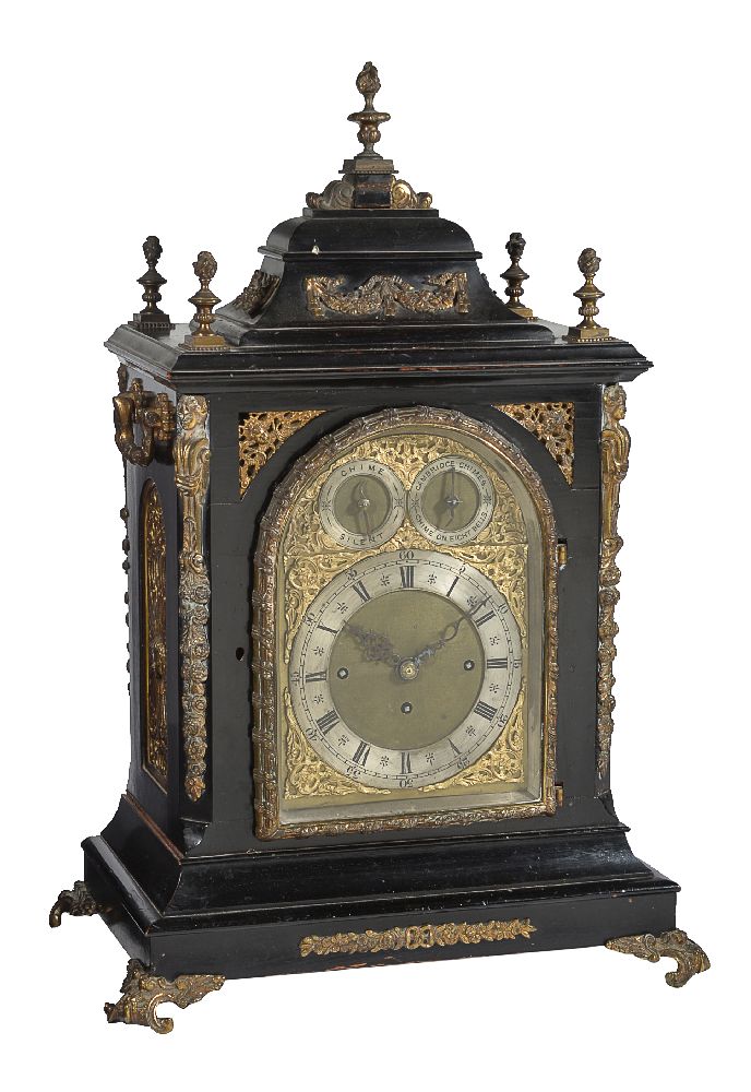 A large gilt brass mounted ebonised quarter chiming bracket clock