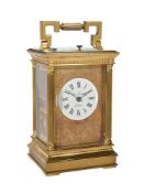 An English lacquered brass carriage clock with push-button repeat
