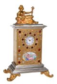 An unusual Swiss paste jewel and enamel inset gilt and electroplated miniature boudoir timepiece