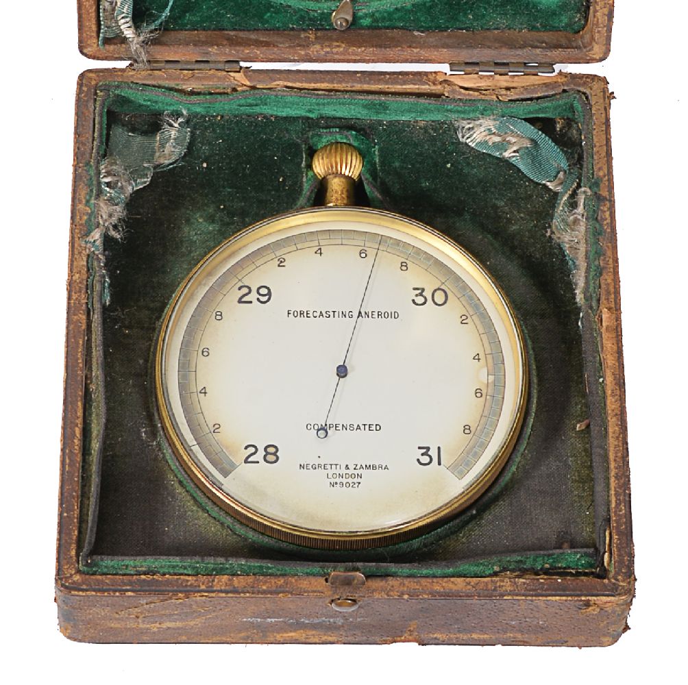 A gilt brass aneroid barometer and a brass weather forecasting calculator - Image 2 of 2