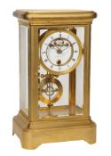 A rare French gilt brass large four-glass mantel timepiece of one year duration