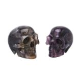 Two carved fluorspar (fluorite) models of human skulls