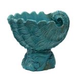 A Burmantofts Faience turquoise-glazed shell-shaped jardiniere and associated columnar stand