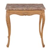 A limed oak and marble topped centre table in Louis XV style