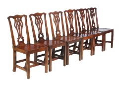 A set of six George III mahogany dining chairs