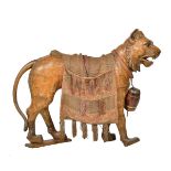 A Continental carved and stained wood model of a tiger
