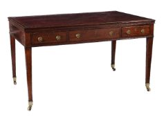 A George III mahogany and leather inset library table