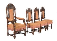 A set of eight oak Carolean revival dining chairs