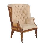 A mahogany and button upholstered tub armchair in William IV style
