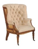 A mahogany and button upholstered tub armchair in William IV style