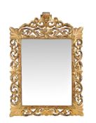 A giltwood and composition wall mirror in 18th century taste