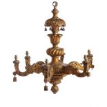 An Italian carved giltwood six light chandelier in Baroque taste