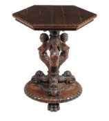 An oak occasional table in Renaissance Revival taste