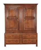 A George III oak press cupboard