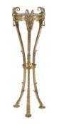 A gilt metal and marble inset torchere stand