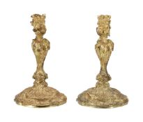 A pair of gilt bronze candlesticks in Louis XV taste