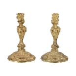 A pair of gilt bronze candlesticks in Louis XV taste