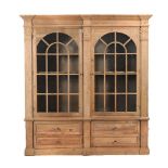 A pine bookcase cabinet