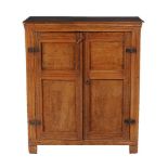 An oak two door cupboard