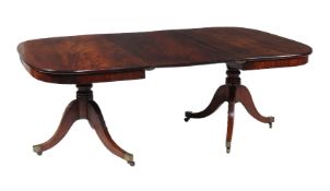 A George III mahogany twin pedestal dining table