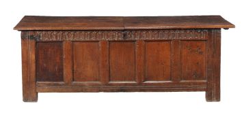 An oak five panel coffer