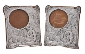 A pair of Edwardian silver photograph frames by Charles S. Green & Co