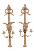 A pair of carved and giltwood twin light wall appliques in Regency/Empire taste