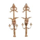 A pair of carved and giltwood twin light wall appliques in Regency/Empire taste