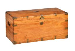 A camphorwood and brass bound trunk