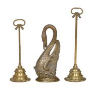 Two similar early Victorian brass door porters