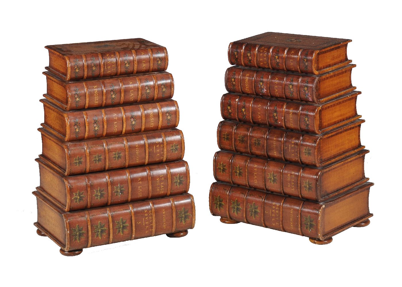 A pair of bedside chests in the form of six false book bindings
