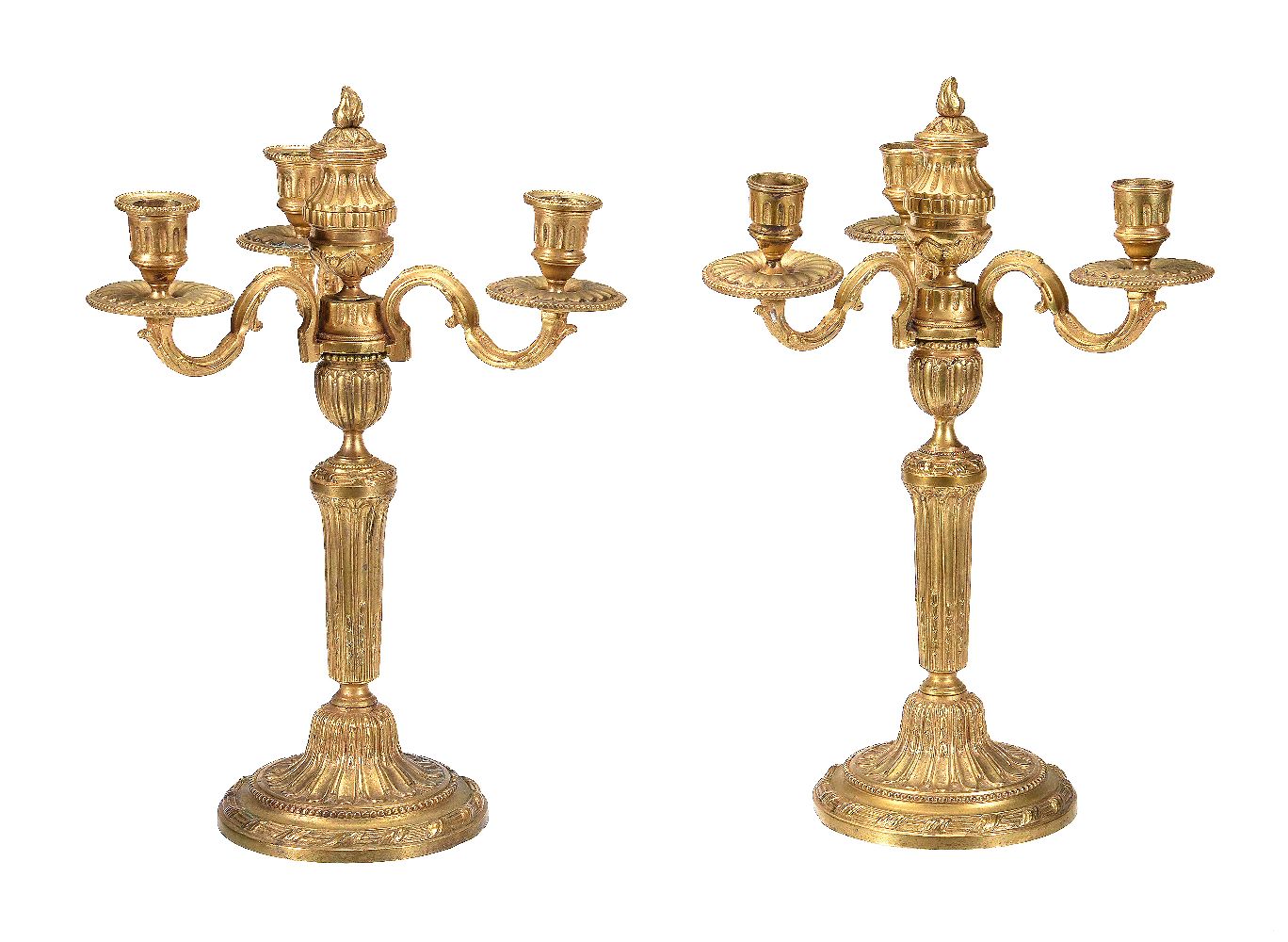 A pair of gilt bronze three light candelabra in Louis XVI style