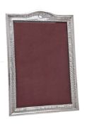 A silver large photograph frame by Walker & Hall