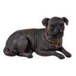 An Austrian painted terracotta model of a recumbent pug